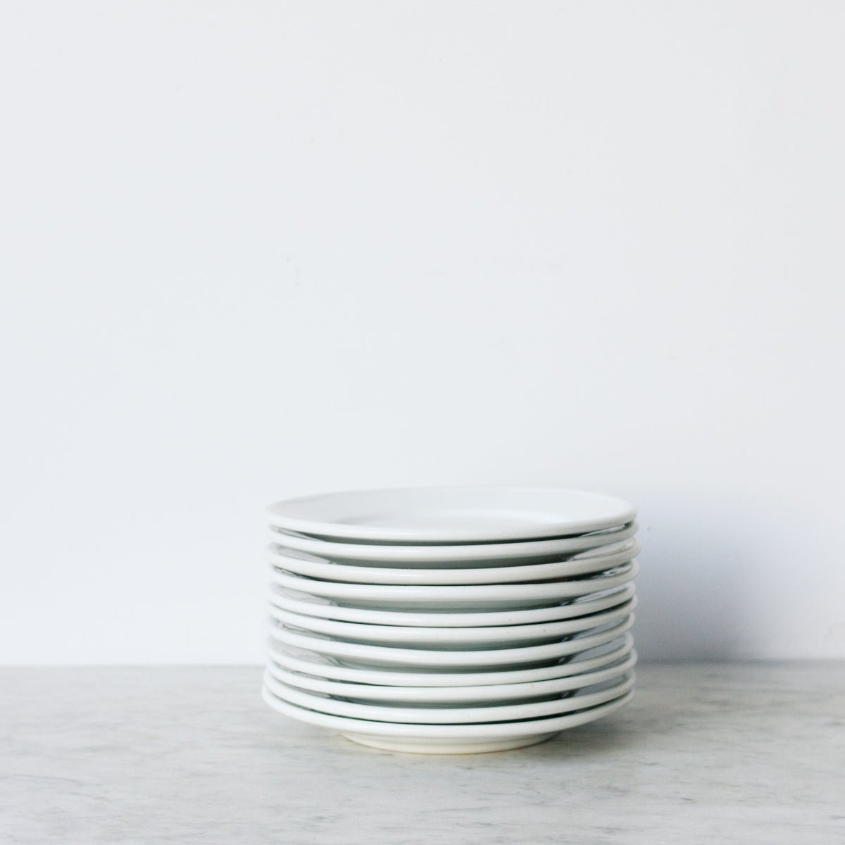 Lot de 8 assiettes en porcelaine de Limoges Bistro