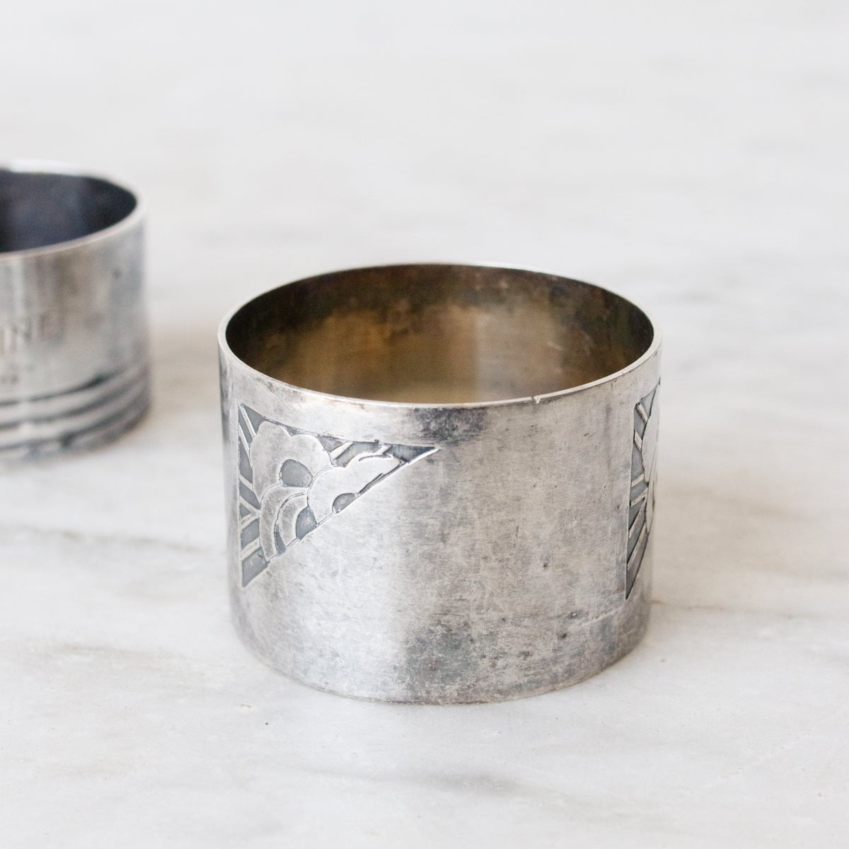 Paire de ronds de serviette en argent