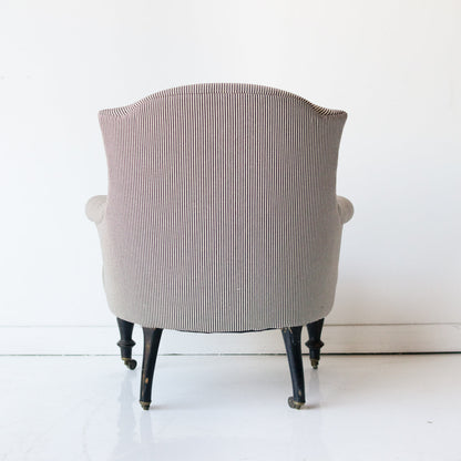 Petite chaise rayée rembourrée