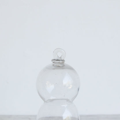 Cloche en verre avec dessous de verre en argent