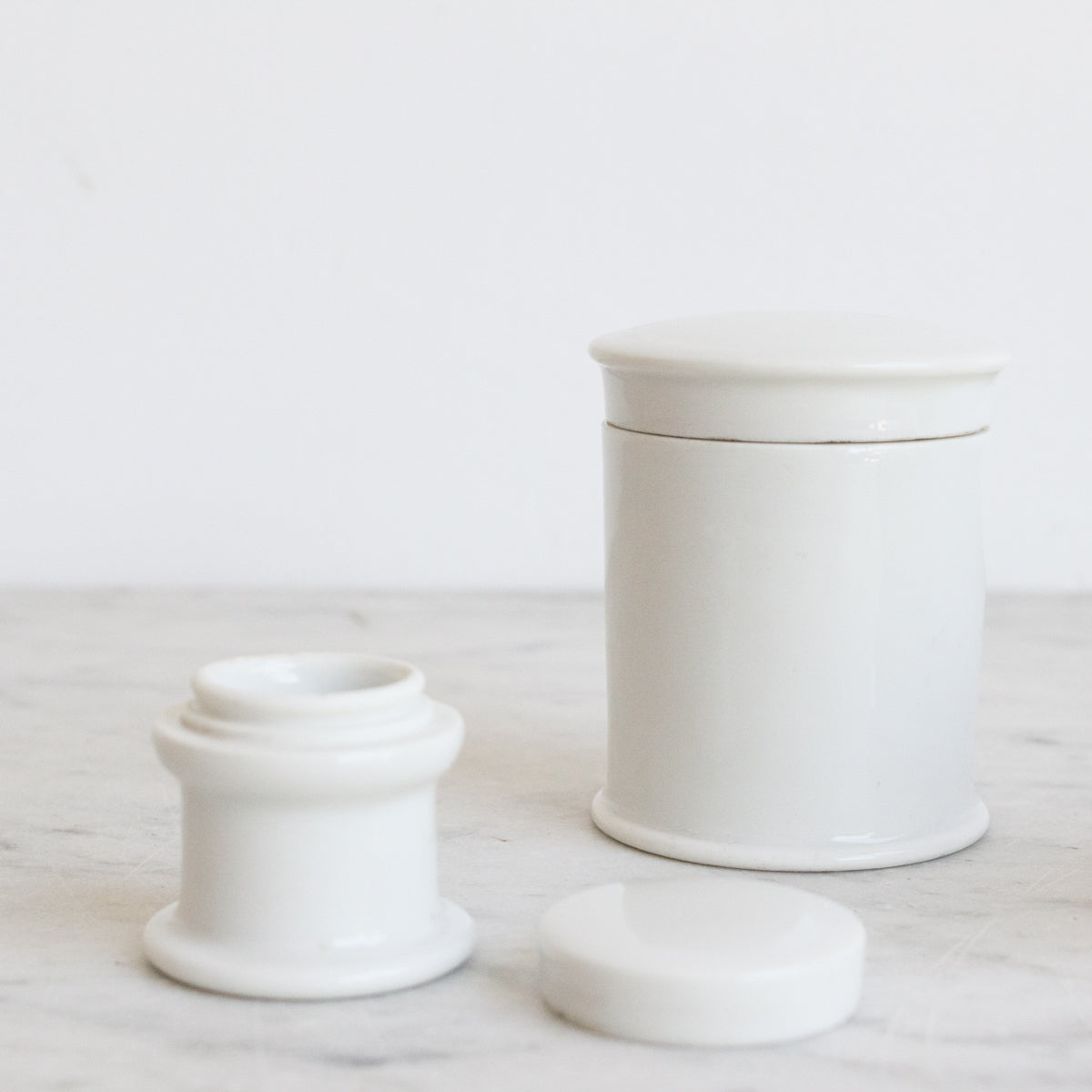 Lot de 4 boîtes en porcelaine