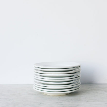 Lot de 8 assiettes en porcelaine de Limoges Bistro