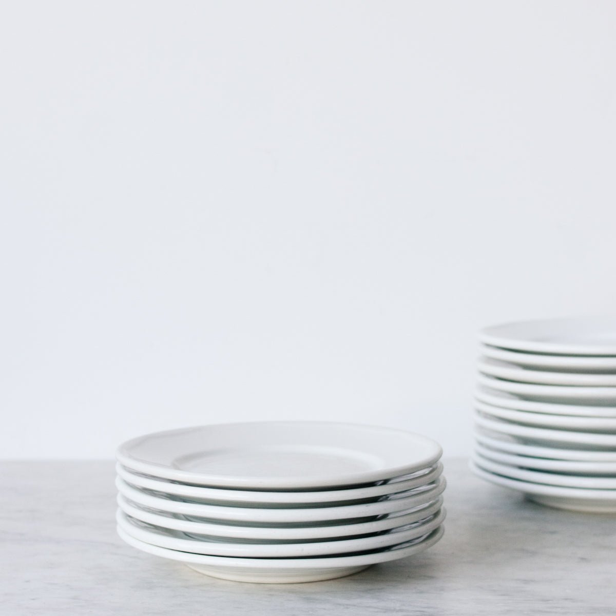 Lot de 8 assiettes en porcelaine de Limoges Bistro