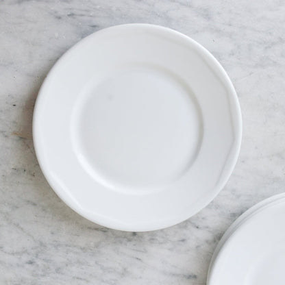 Lot de 8 assiettes en porcelaine de Limoges Bistro